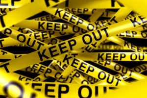 3d rendering of caution tape with KEEP OUT written on it
